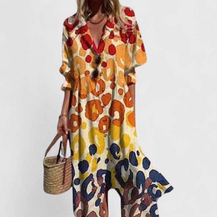 Filippa | Dame midikjole med blomsterprint og knaplukning