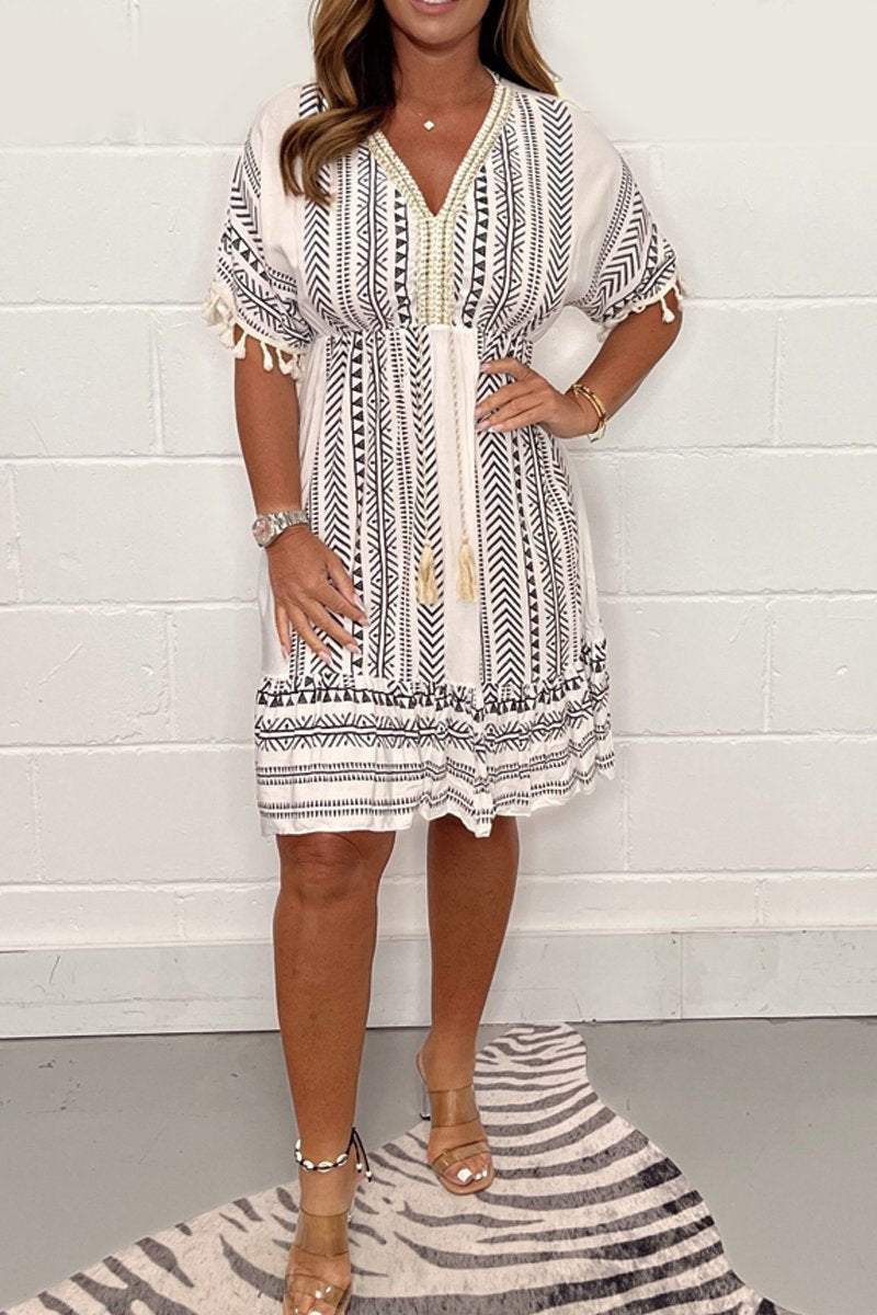 Saga | Dame boho minikjole med print og kvastdetaljer