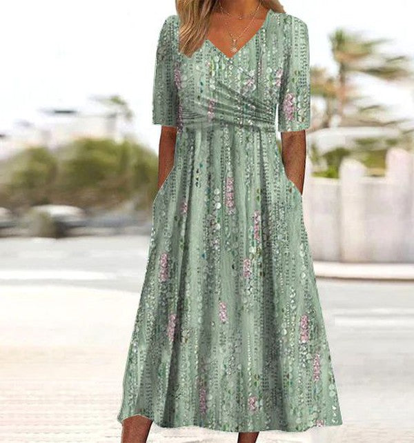 Pernille | Dame boho midikjole med blomsterprint og A-form