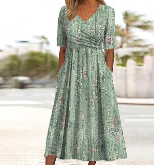 Pernille | Dame boho midikjole med blomsterprint og A-form
