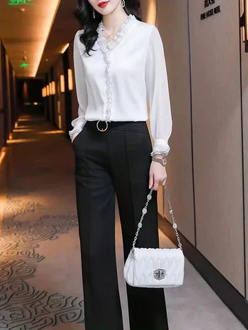 Agnes | Dame elegant bluse med flæser og lange ærmer samt pasform